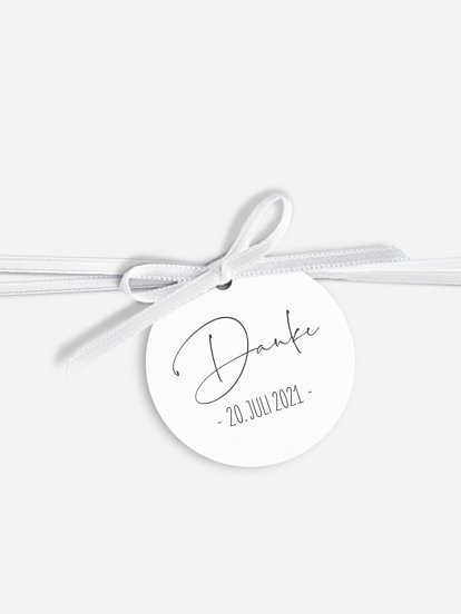 Anhänger mit Band zur Hochzeit Glücksfotos