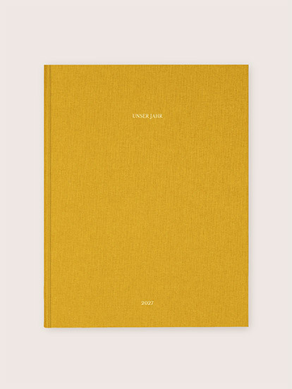 Fotobuch mit Stoffeinband mit Veredelung