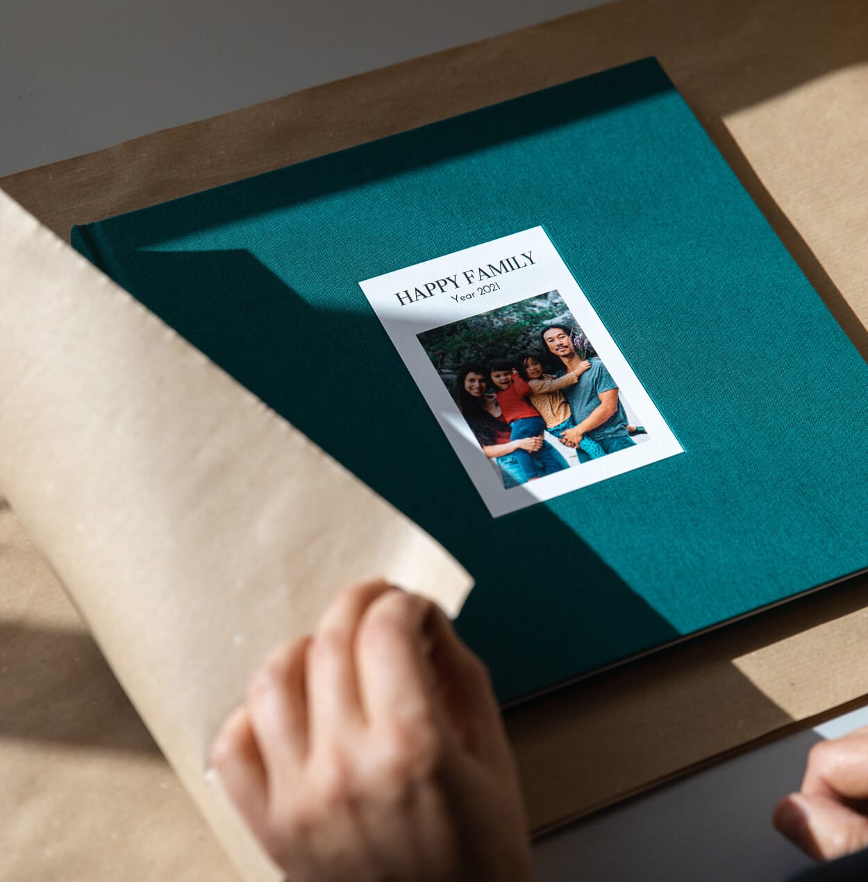 Fotobuch in Geschenkverpackung