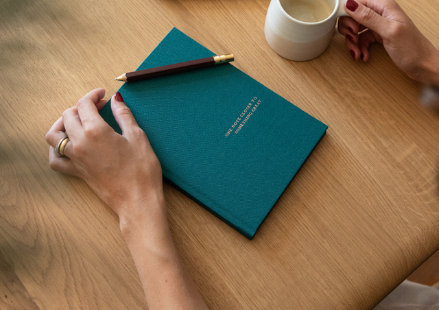 Notizbuch mit Goldtitel
